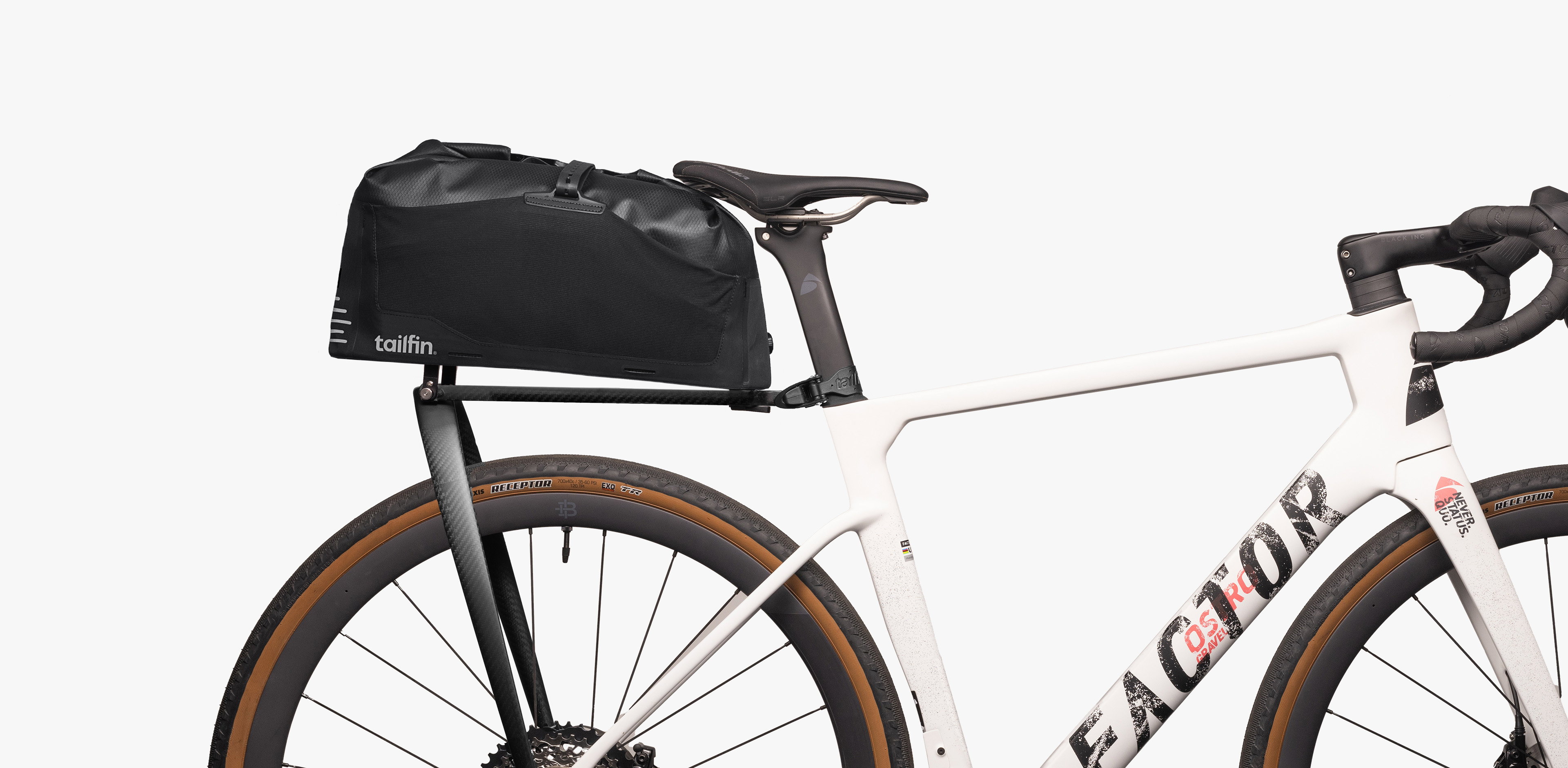 Tailfin AP rack top bag mounted on a Factor gravel bikepacking bike.