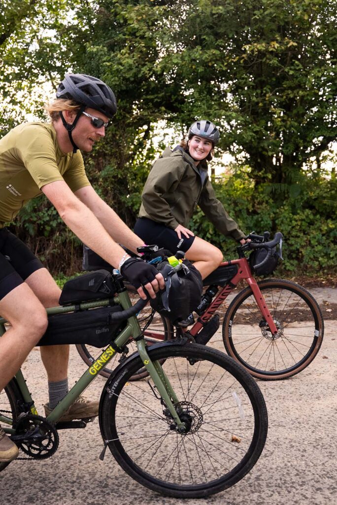 2 people riding Tailfin detours, both using Tailfin bikepacking bags