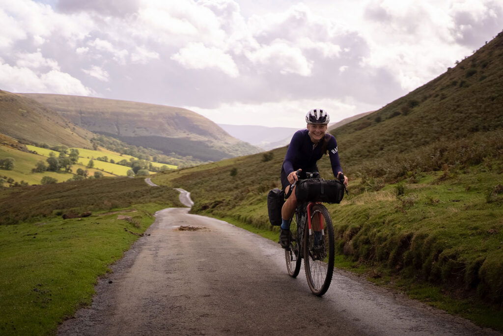 Rider coming up a climb at Tailfin Detours