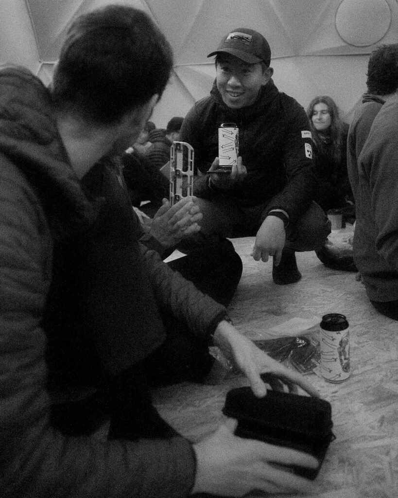 People talking at Tailfin Detours about their prizes