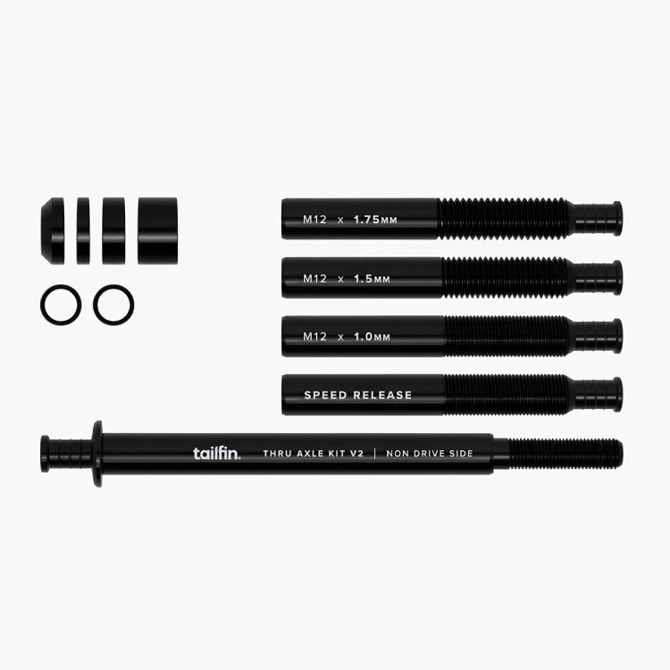 A top down view of the tailfin Universal Thru Axle with all components included