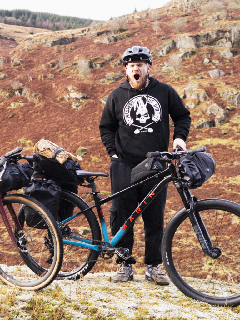 Tailfin bikepacking setup on adventure bikes in the wild winter hills.