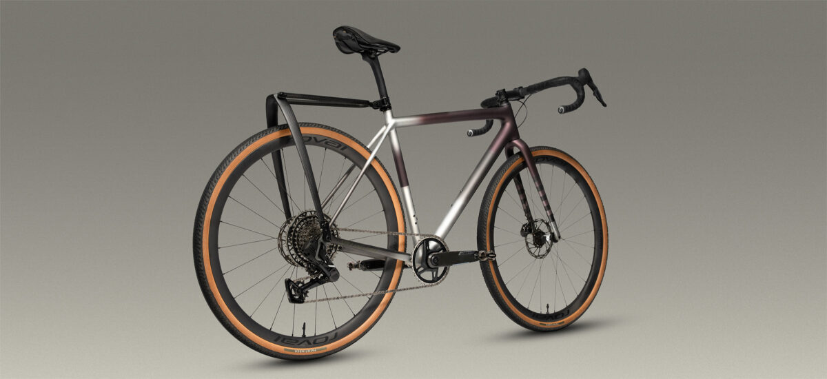 Premium gravel bike equipped with an integrated Tailfin carbon rear rack system.