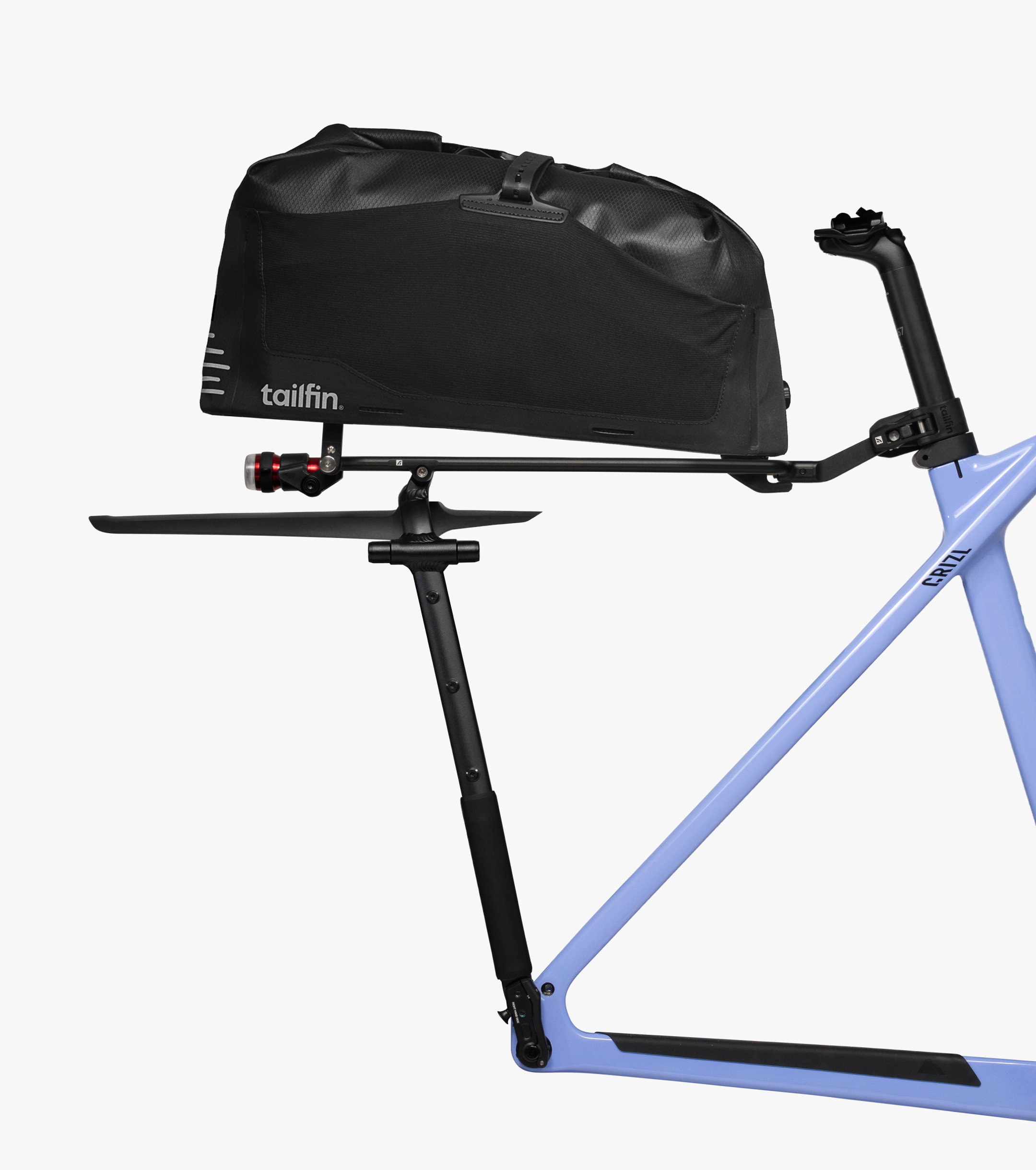 Tailfin bike rack and trunk bag mounted on a blue gravel bicycle.