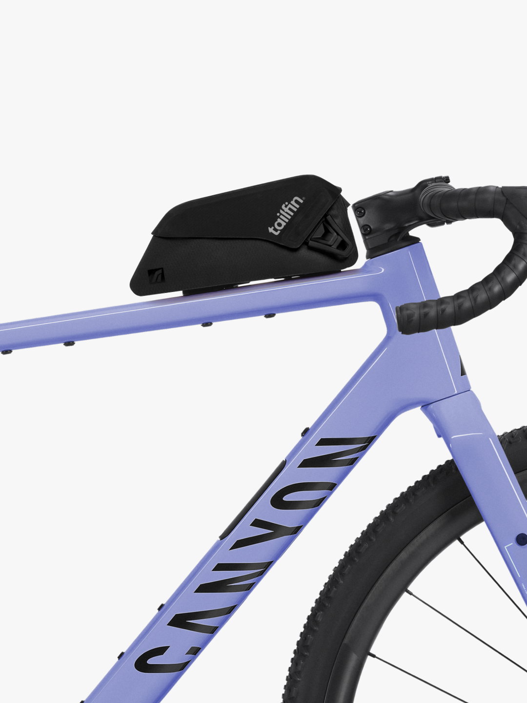Tailfin top tube bag mounted on a lavender Canyon gravel bike.