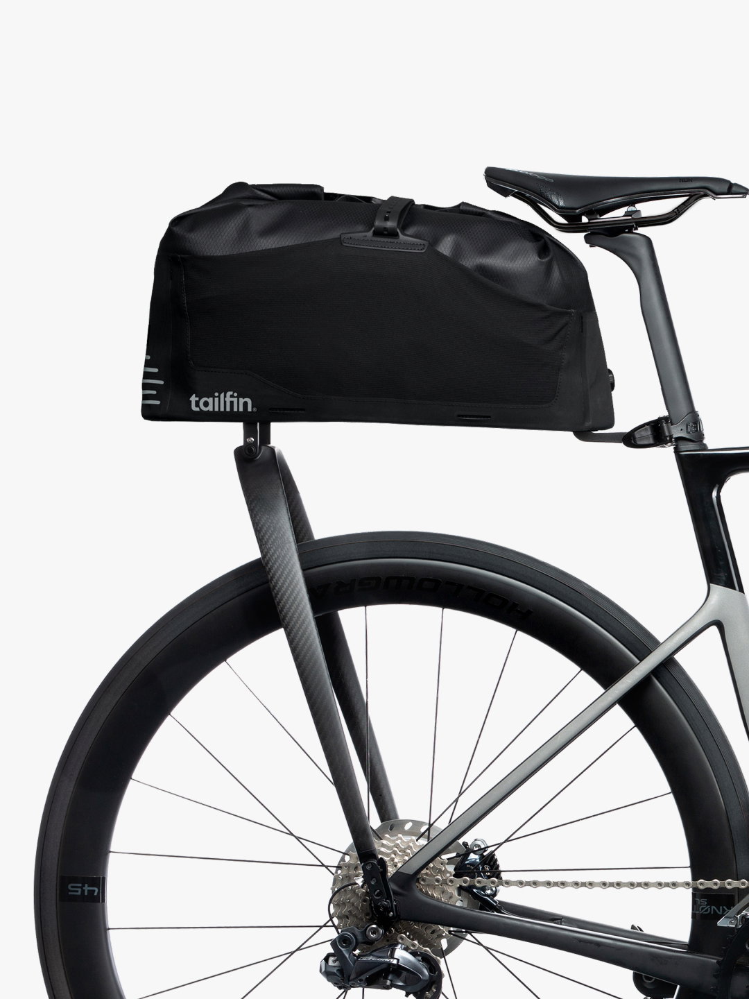 Tailfin waterproof bikepacking rear bag mounted on a carbon fibre road bike.